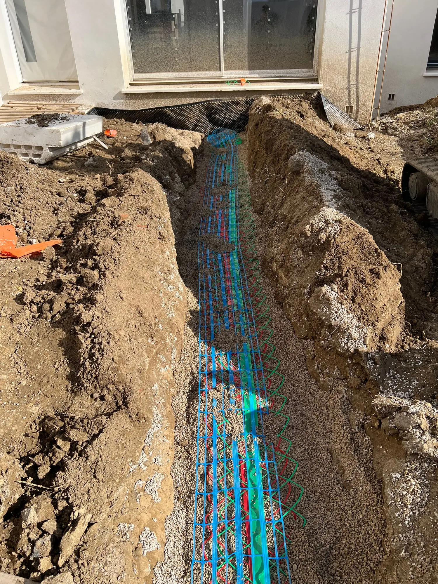 Gaines TPC déroulées dans la tranchée avant remblaiement